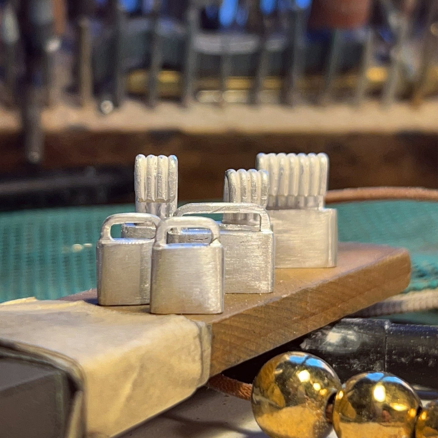 Cast silver jewelry components on wood mold, Trésors de St Barth atelier