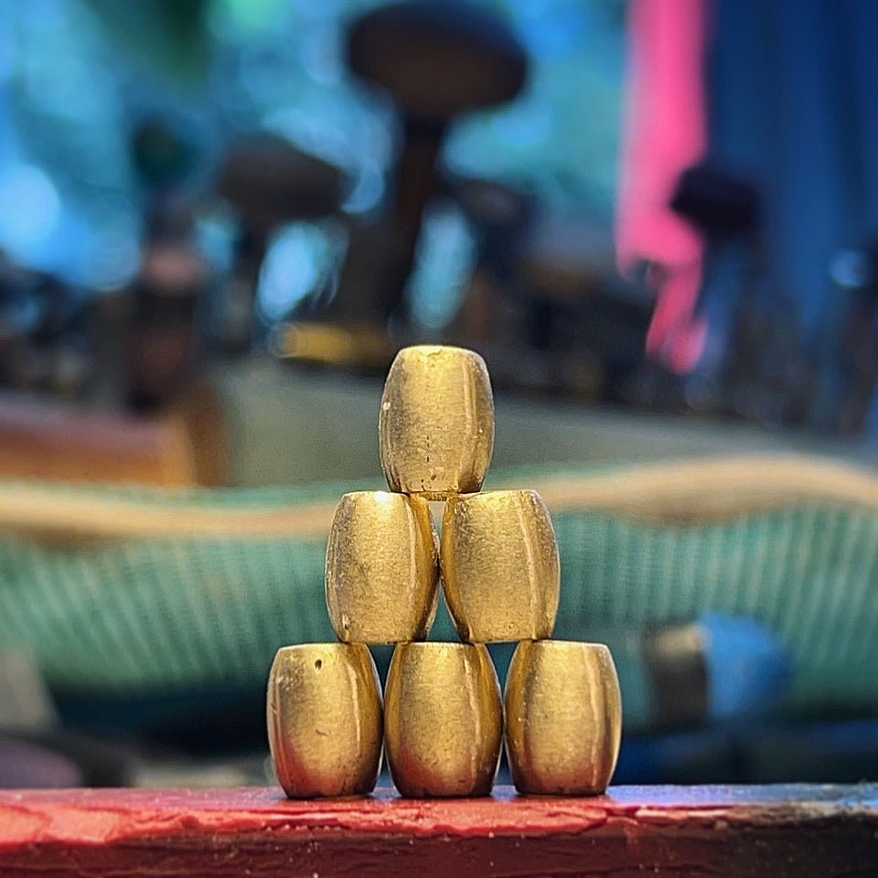 Stacked hand-sculpted 24K gold barrel beads, Trésors de St Barth workshop