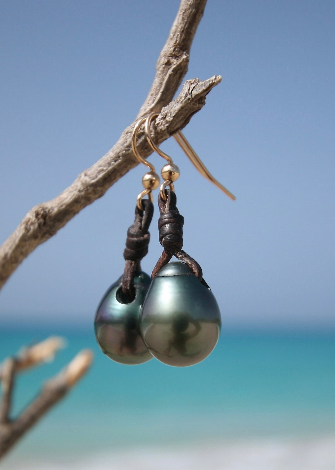 Tahitian black pearl drop earrings on leather cord, St Barth driftwood