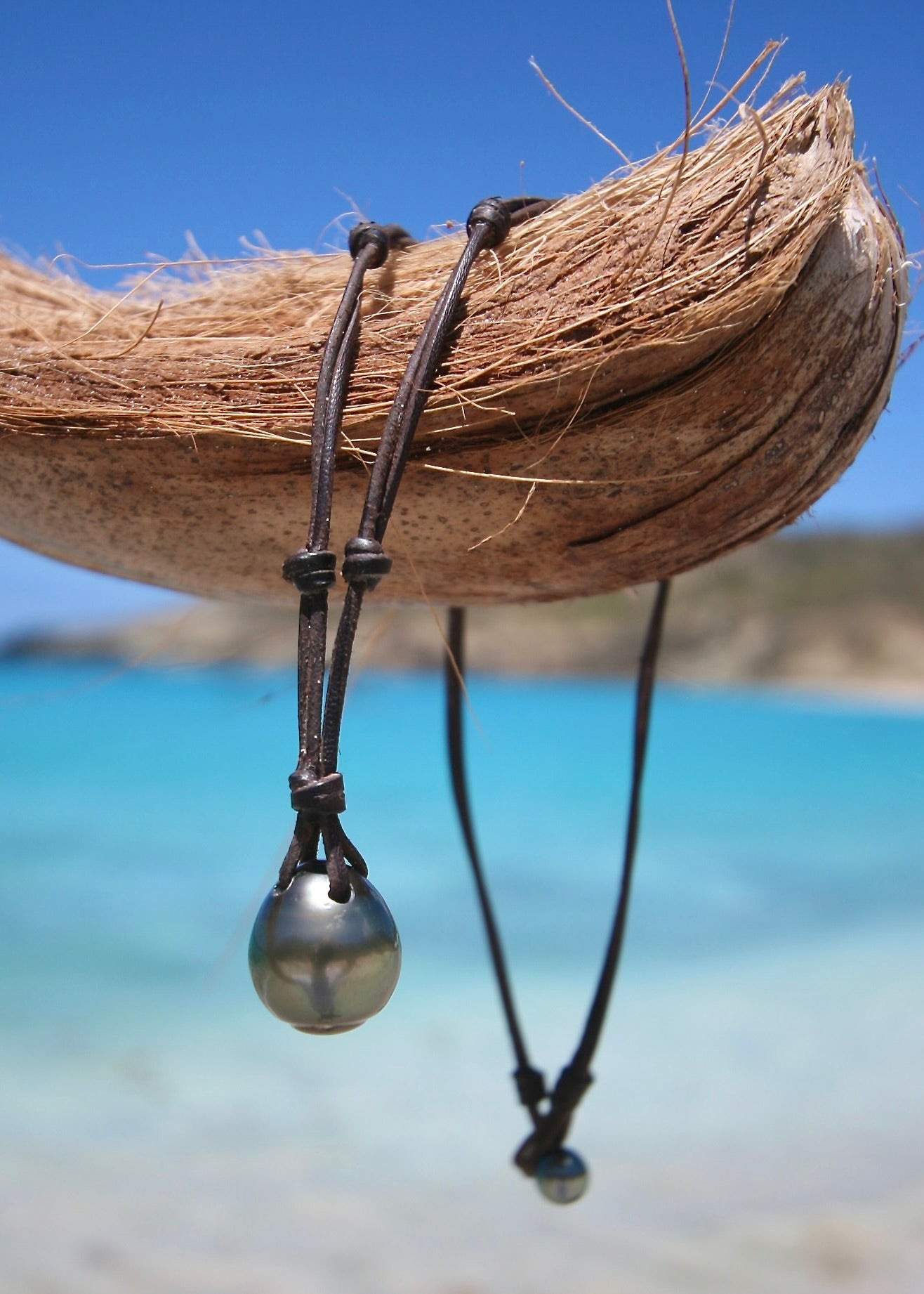 Exceptional large Tahitian pearl pendant on leather cord, St Barth beach