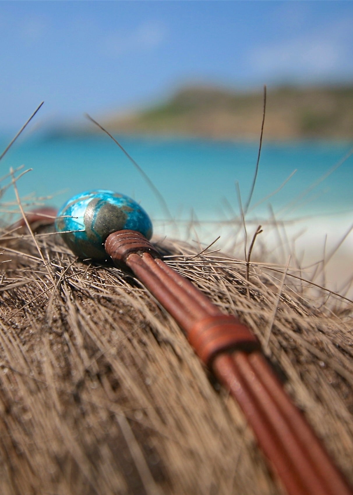 Handmade turquoise leather bracelet on palm fiber, Caribbean turquoise sea