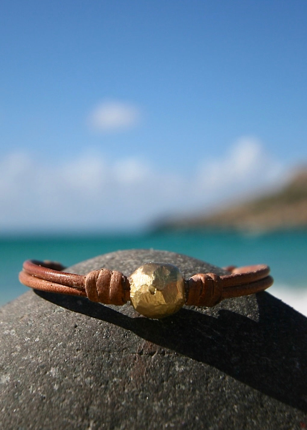 Hand-sculpted 18K gold bead bracelet on kangaroo leather, St Barth rock