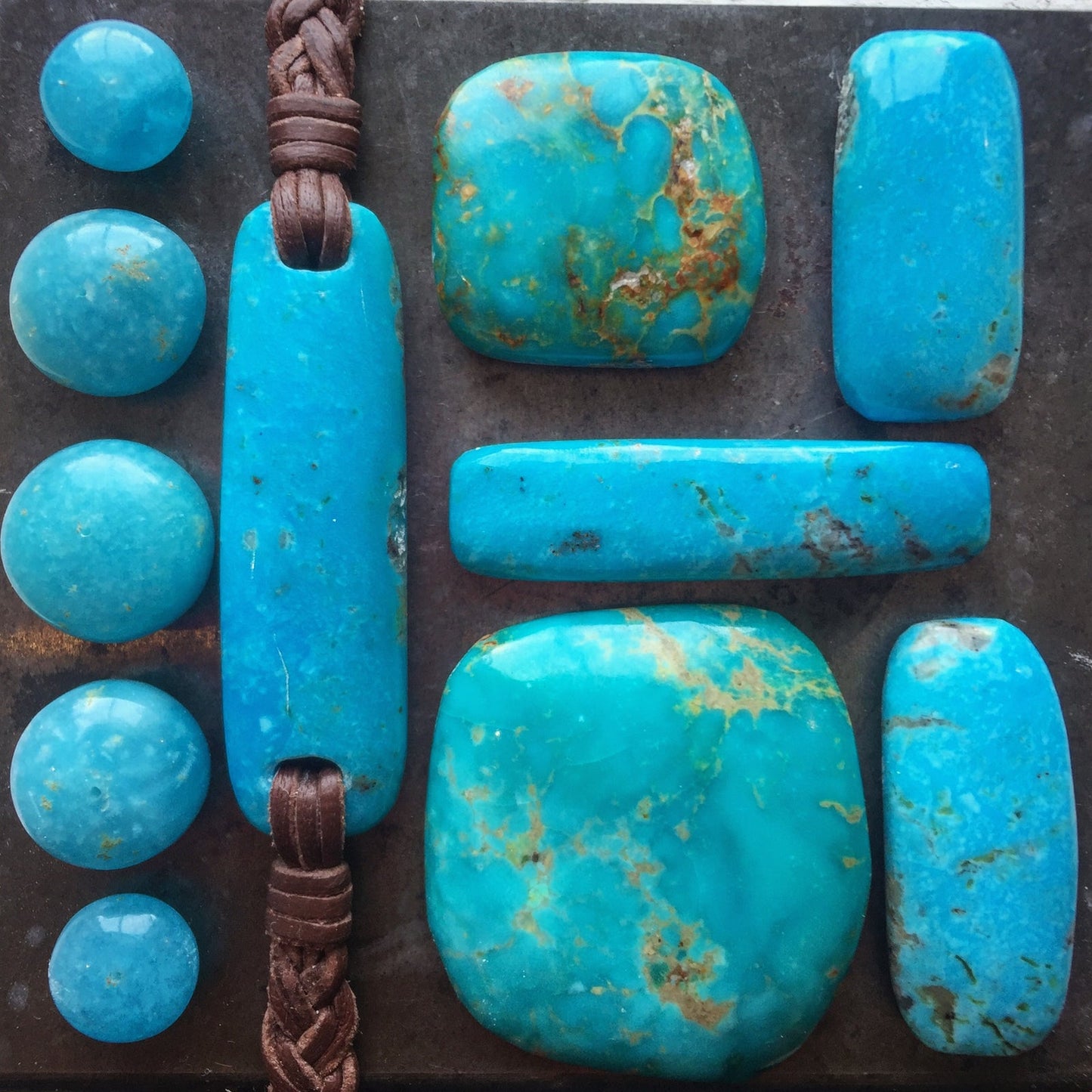 Genuine turquoise cabochon collection on leather cord, workshop stone selection