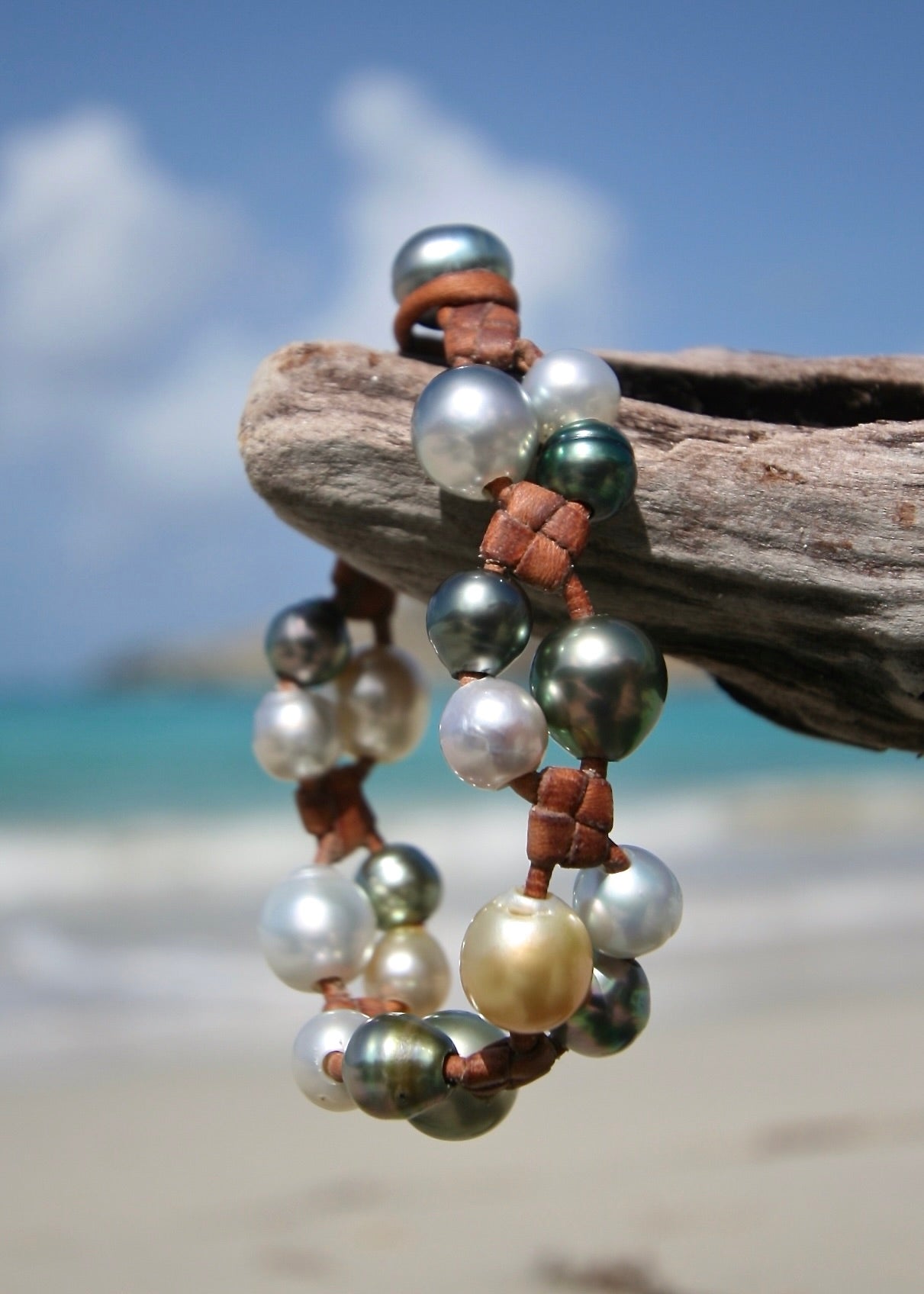 Multicolor cultured pearl cluster leather bracelet on driftwood, St Barth island