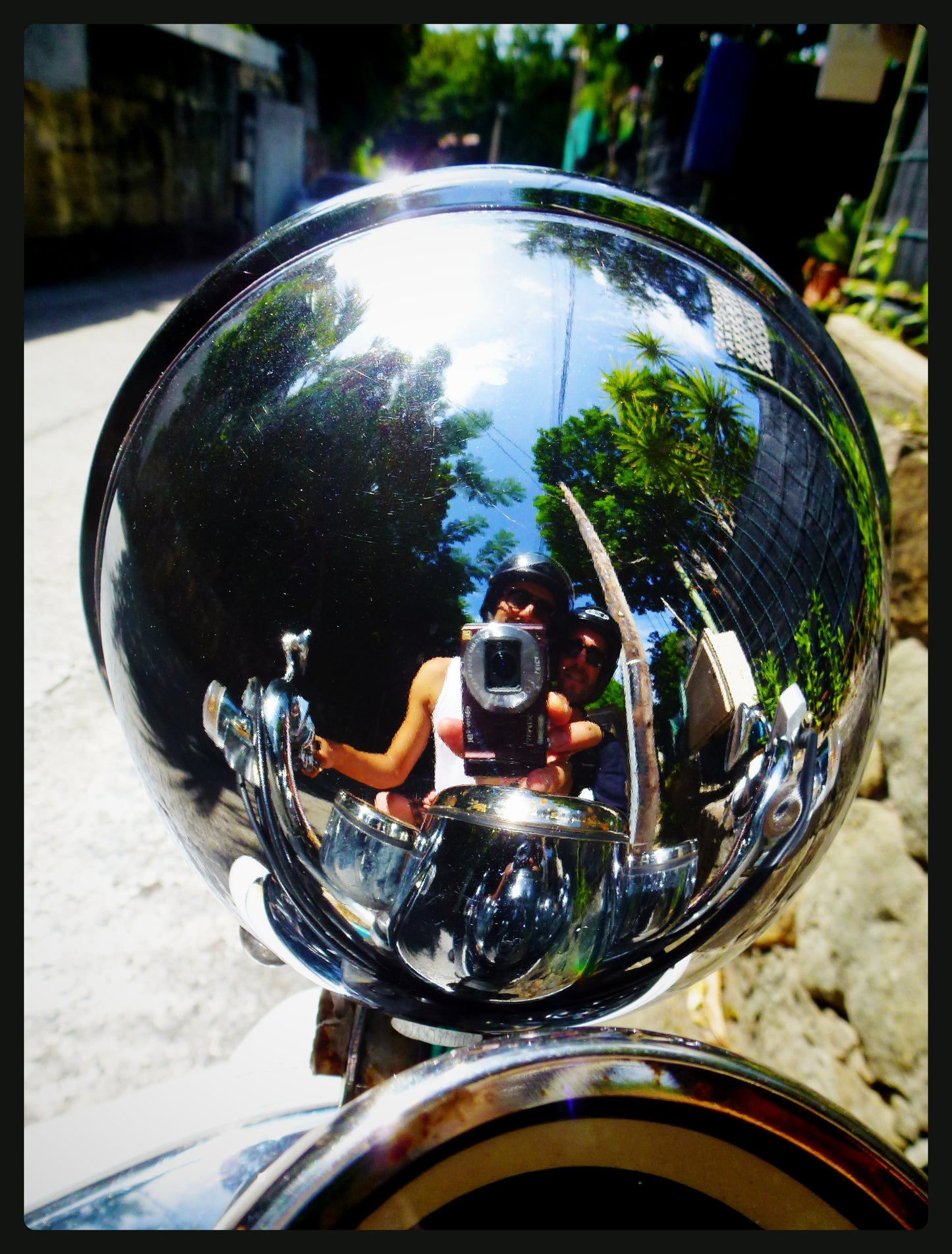scooter reflecting tropical garden and St Barth nature ted deltour and friend