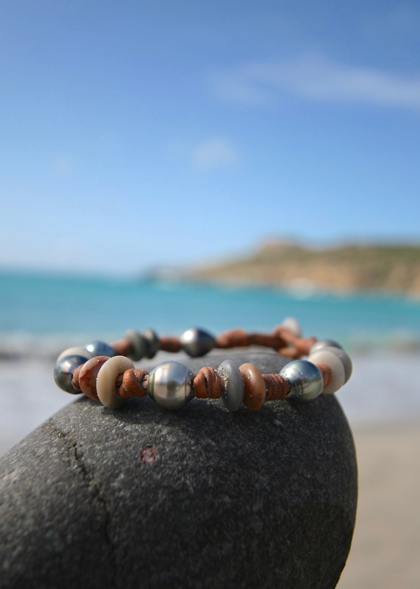 Tahitian pearl and sea pebble bracelet on leather, St Barth beach rock