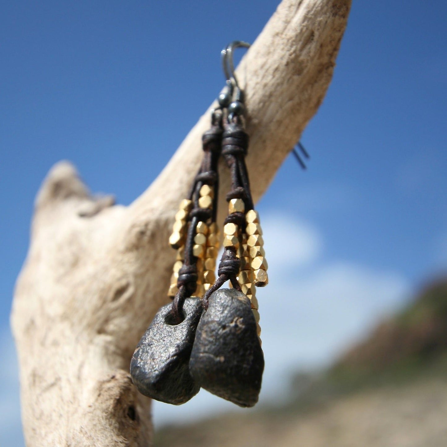 Black stone tassel earrings with gold beads on leather cord, one of a kind jewelry St Barth