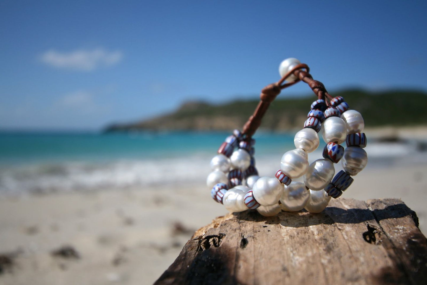 Multi-strand pearl and patterned glass bead bracelet on driftwood, one of a kind jewelry St Barth