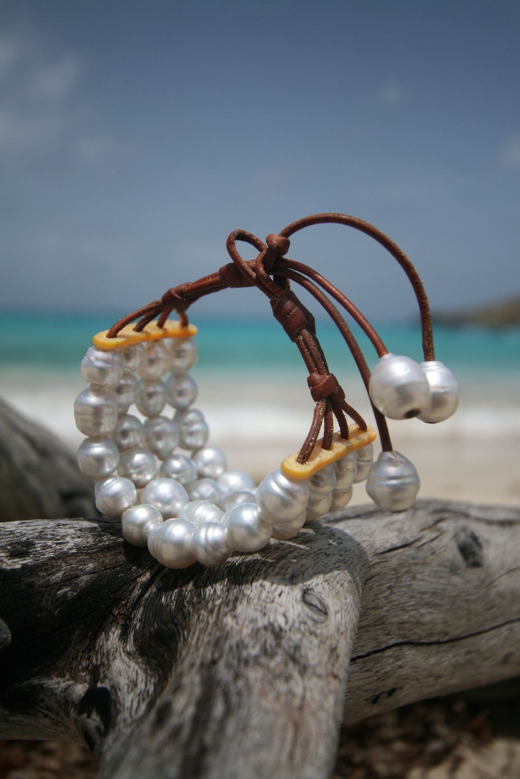 Pearl cluster bracelet with brown leather knotted cords on driftwood, one of a kind jewelry St Barth