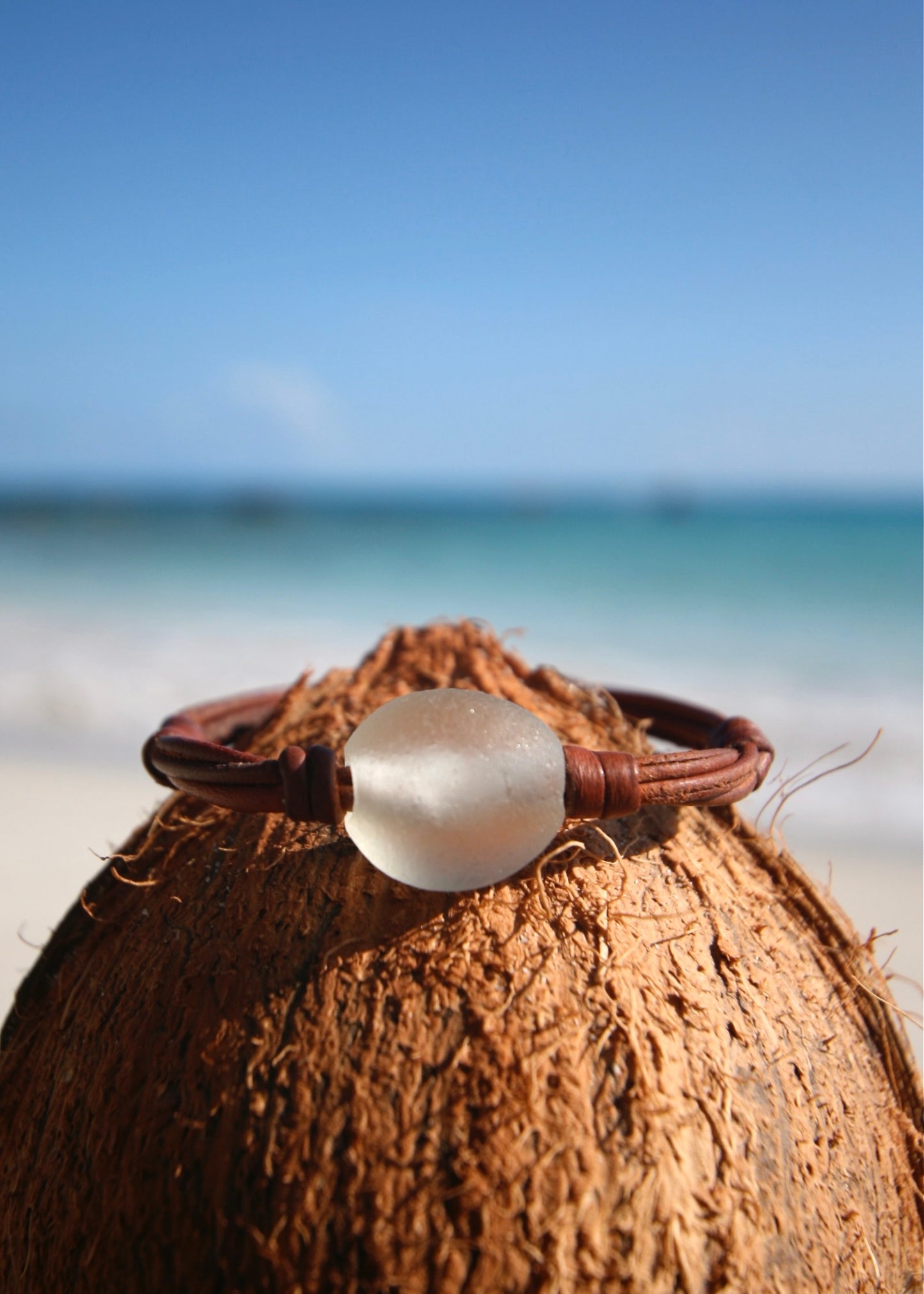 Authentic Seaham sea glass bubble mounted with sailor knots on hand rolled kangaroo leather bracelet