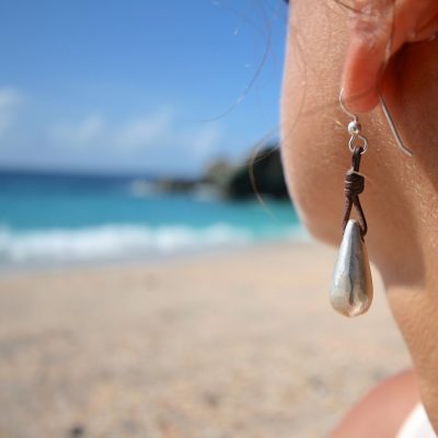 Handmade silver drops earnings strung on leather, boho jewelry, beach jewelry, leather jewelry, St Barth signature, textured drop eating.