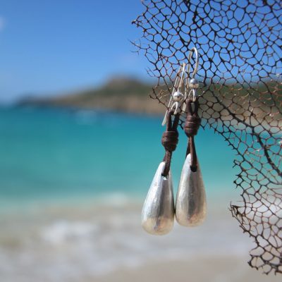 Handmade silver drops earnings strung on leather, boho jewelry, beach jewelry, leather jewelry, St Barth signature, textured drop eating.