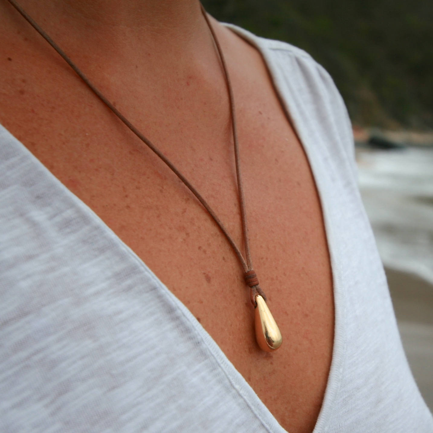 Handmade 18k gold drop strung on leather with Tahitian cultured pearls, boho beach jewelry, leather jewelry, St Barth signature, gold love