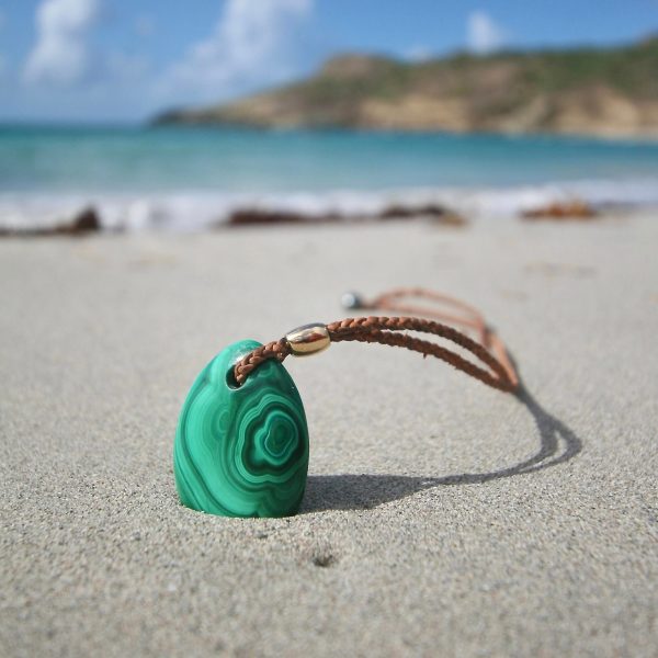 Malachite pebble necklace with 18k gold element mounted on leather with Tahitian pearl clasp, hand carved, beach jewelry from St Barthelemy